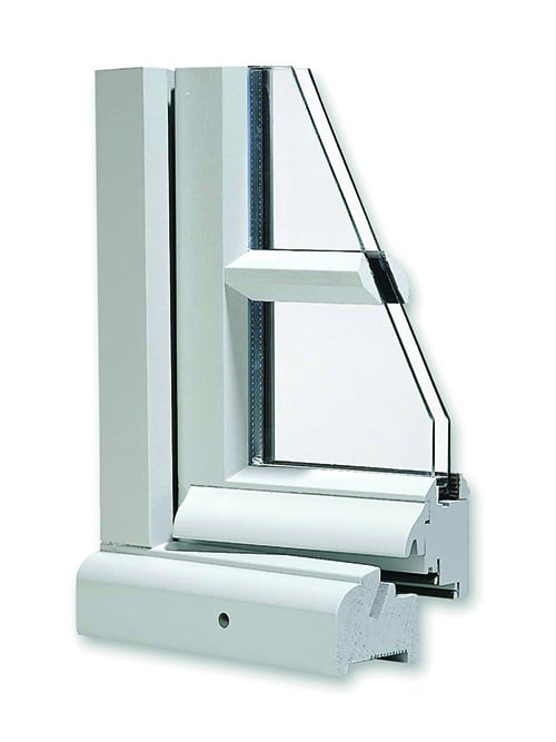 A detail view of a historical jet d’eau wood window and door style.