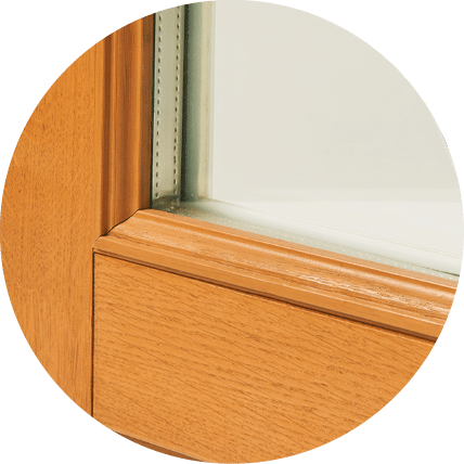 A detail view of a classic moulded wood window and door style.