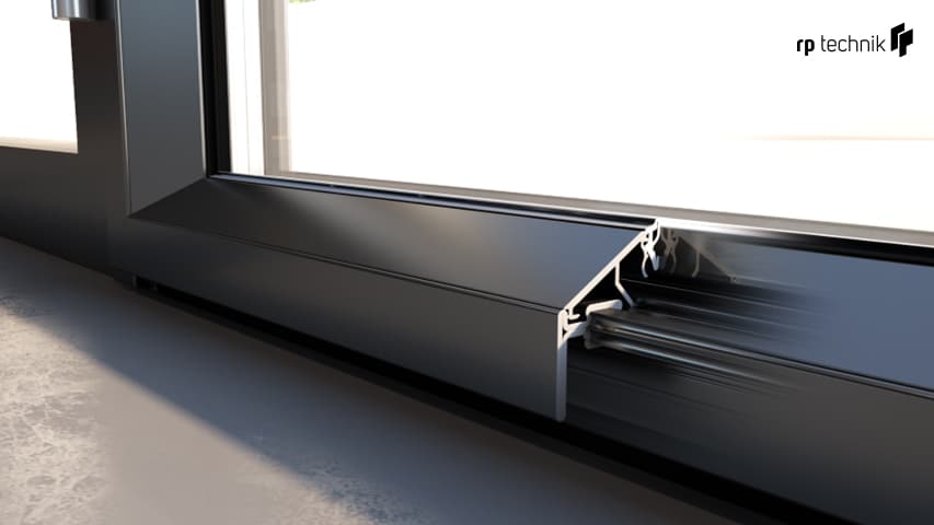 A close-up detail of a hand-welded steel window assembly.