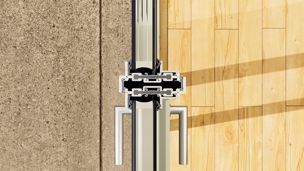 A cross-section of a steel door detailing the thermal break.