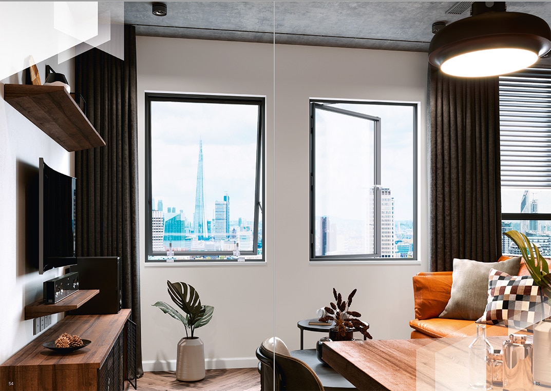 An interior view of an apartment with steel windows with the outward opening option.