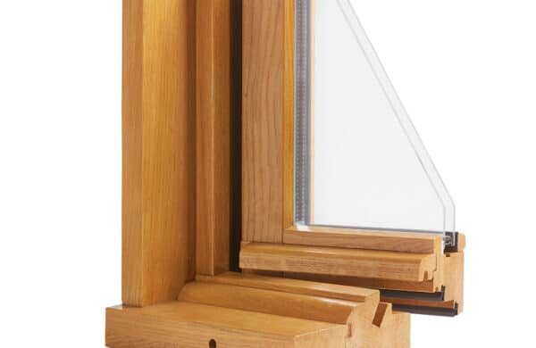 A cross-section of a wood window detailing the thermal break.